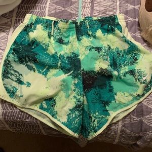 Green Nike shorts